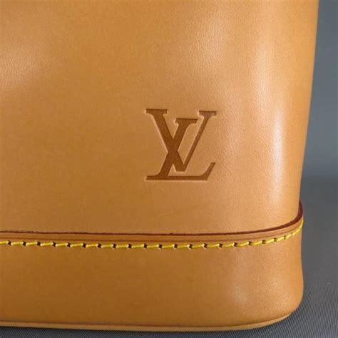 louis vuitton patina leather|louis vuitton natural leather.